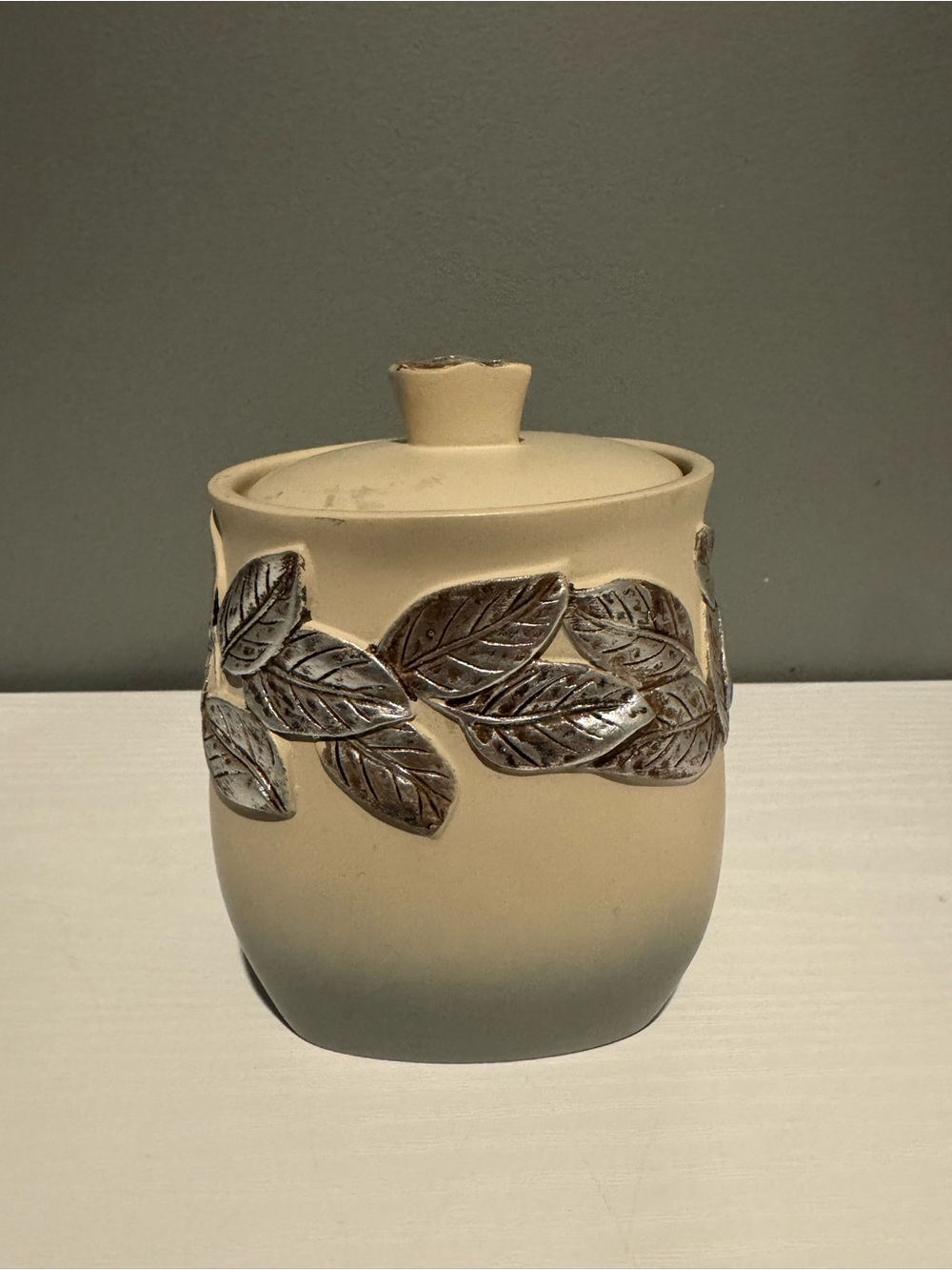 Handcrafted Cotton Ceramic Leaf Jar in Cream with Silver Accents